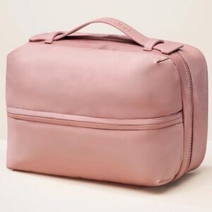 SELENA GOMEZ Comfort Puffy Toiletry Bag in Find Mauve Comfort  by Rare Beauty